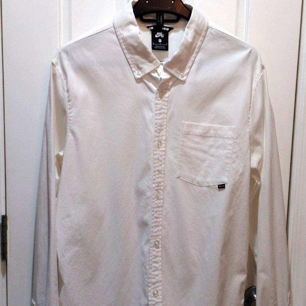 Nike button down shirt.